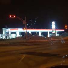 Couche-Tard / Esso | 8175 Boulevard Cousineau, Saint-Hubert, QC J3Y 5M4, Canada