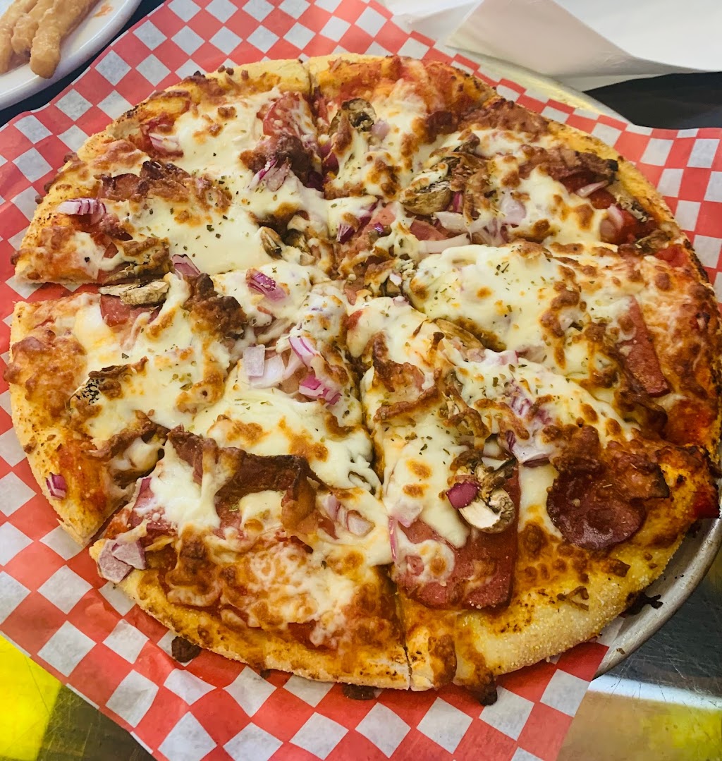 Minhas Pizza Brew - Calgary | 1314 44 Ave NE, Calgary, AB T2E 6L6, Canada | Phone: (403) 695-3706