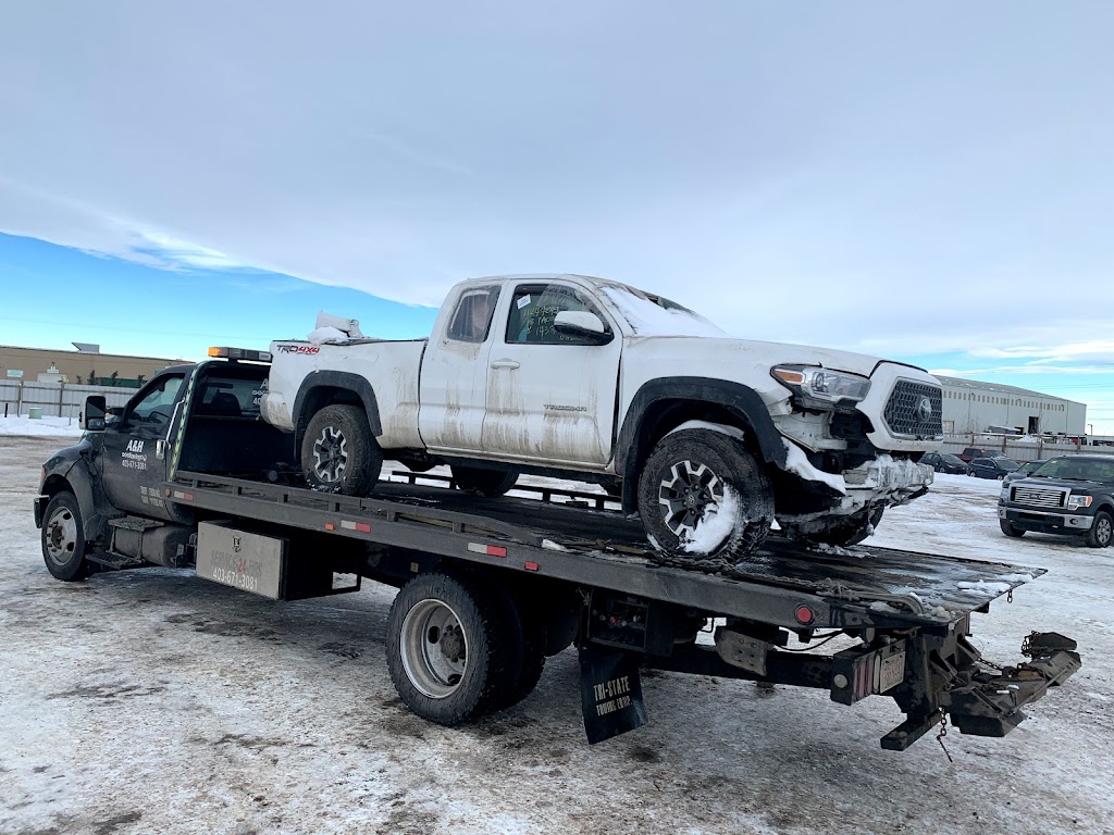 A&H TOWING INC | 3307 48 St NE, Calgary, AB T1Y 1R9, Canada | Phone: (403) 671-3081