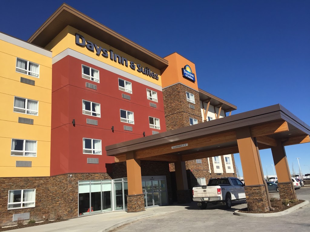 Days Inn & Suites by Wyndham Airdrie | 911 Highland Park Cove Northeast, Airdrie, AB T4A 0R2, Canada | Phone: (587) 600-0297