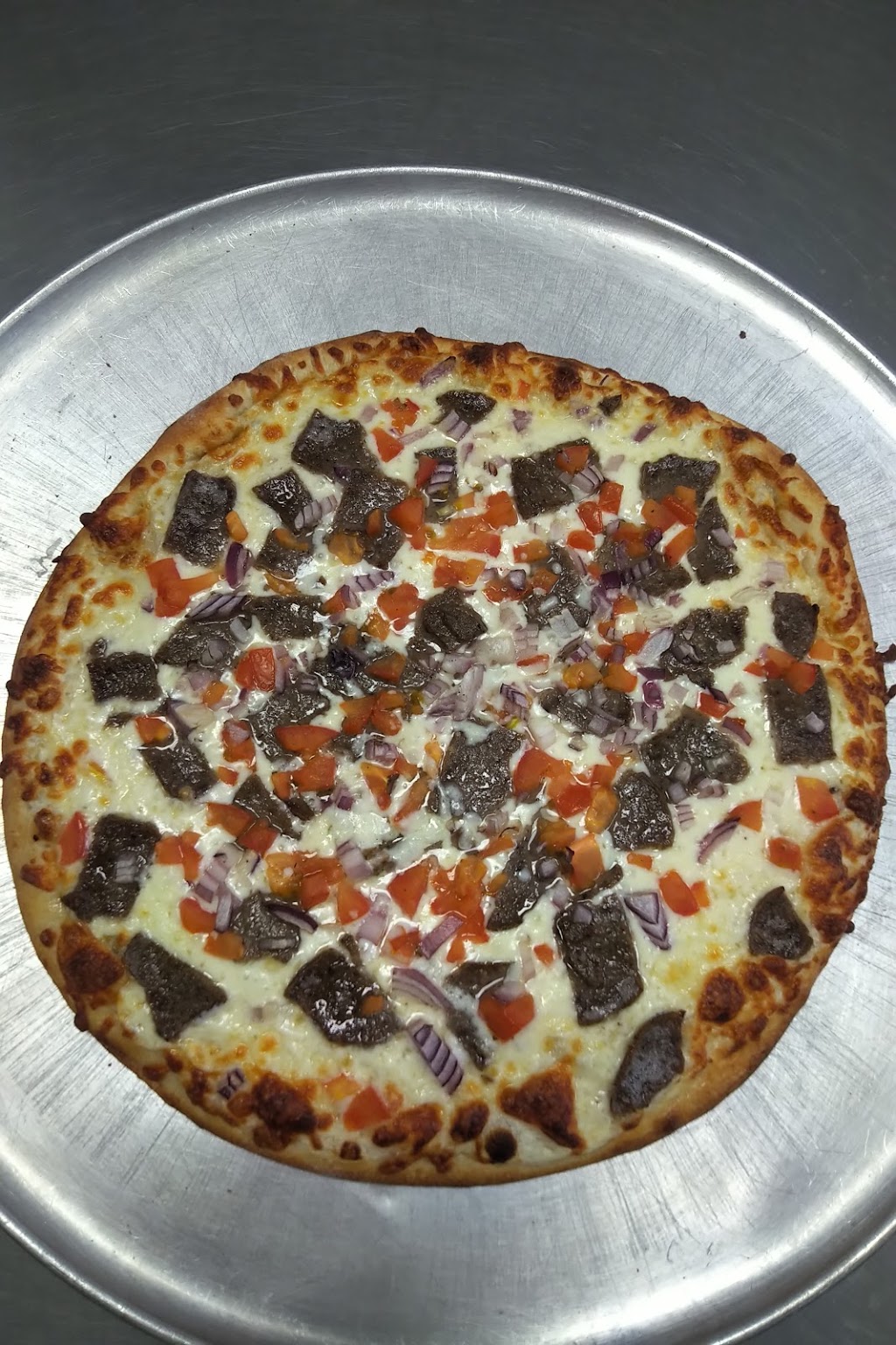 Famous Pizza | 28 Queen St W, Cambridge, ON N3C 1G1, Canada | Phone: (519) 220-1295