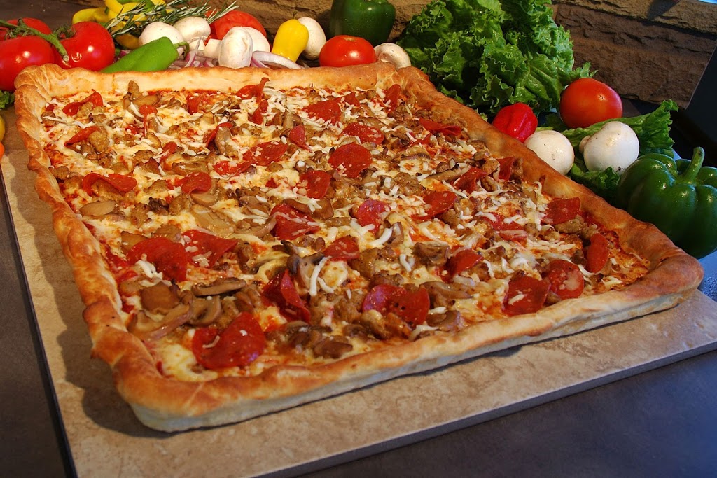 Dynamite pizza | 15 Speedvale Ave E, Guelph, ON N1H 1J2, Canada | Phone: (519) 824-8808