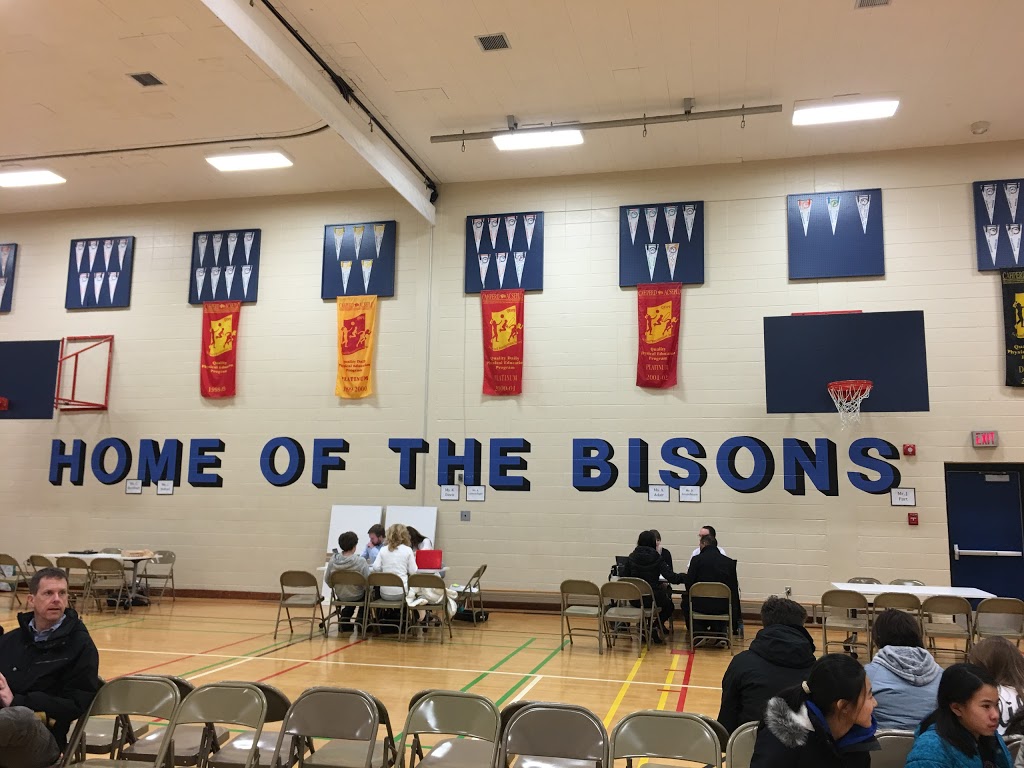 Louis Riel Elementary Junior High School | 9632 Oakfield Dr SW, Calgary, AB T2V 0J1, Canada | Phone: (403) 777-7650