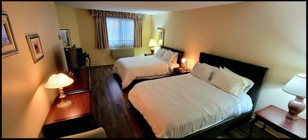 Chambre Deluxe | 252 Chem. du Lac-Millette, Saint-Sauveur, QC J0R 1R3, Canada | Phone: (514) 889-4412