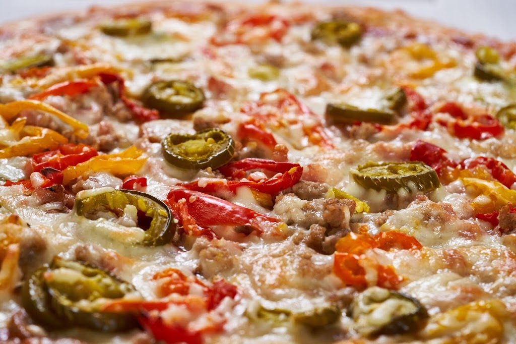 Howies Pizza | 4704 26 Ave SW, Calgary, AB T3E 0R2, Canada | Phone: (403) 240-3228