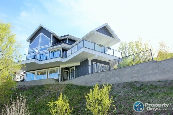 PropertyGuys.com Kelowna | 2202 Bennett Rd #2, Kelowna, BC V1V 2C2, Canada | Phone: (250) 826-6532