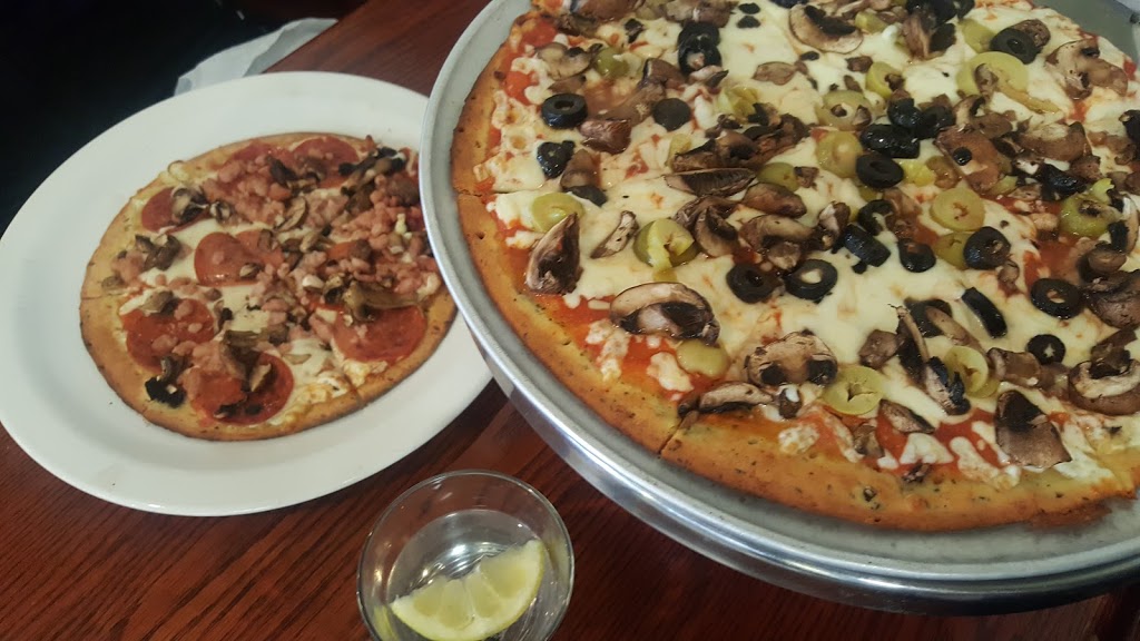 Big Slice Restaurant | 1154 St Clair Ave W, Toronto, ON M6E 1B3, Canada | Phone: (416) 651-7777