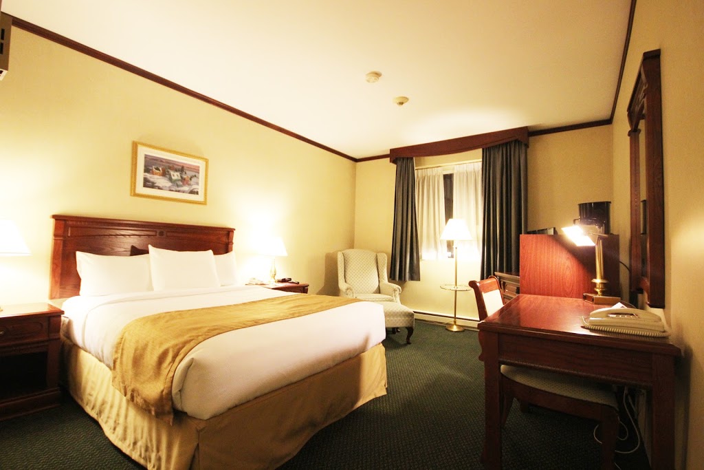 Travelodge by Wyndham Montreal Airport | 7300 Chemin de la Côte-de-Liesse, Saint-Laurent, QC H4T 1E7, Canada | Phone: (514) 733-8818