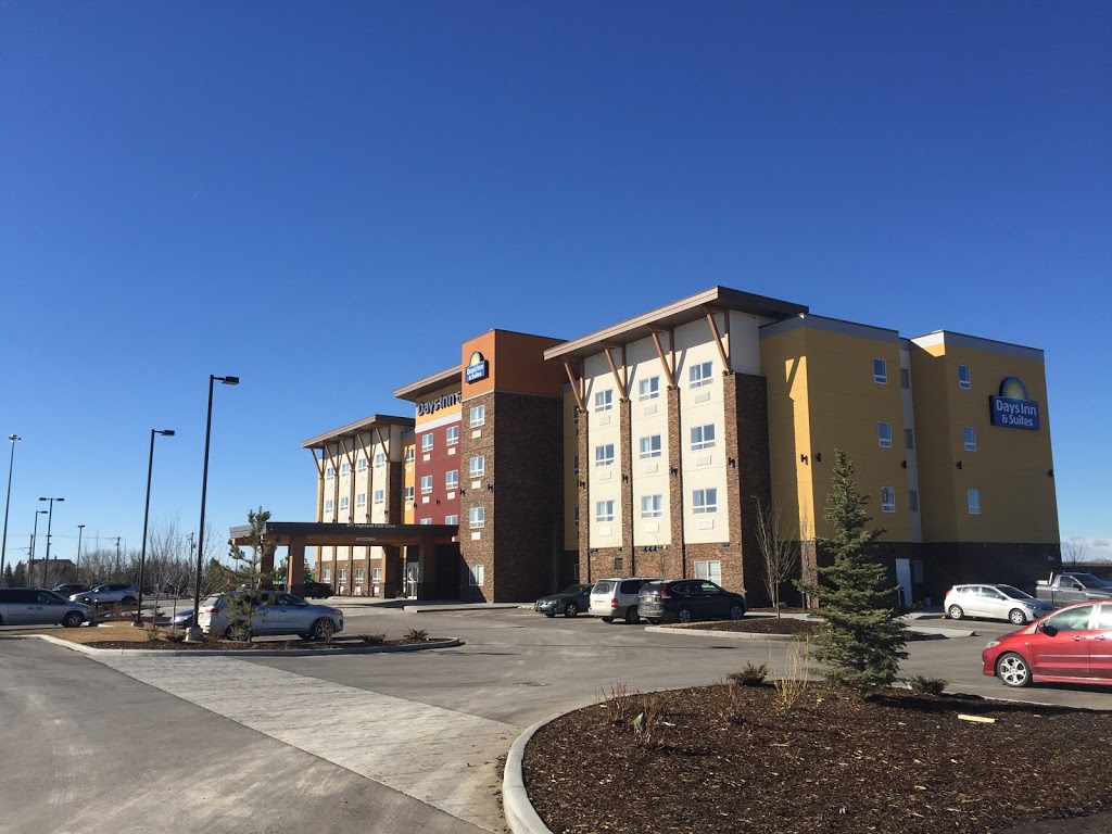 Days Inn & Suites by Wyndham Airdrie | 911 Highland Park Cove Northeast, Airdrie, AB T4A 0R2, Canada | Phone: (587) 600-0297