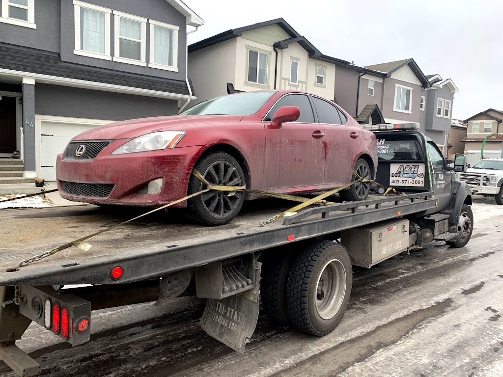 A&H TOWING INC | 3307 48 St NE, Calgary, AB T1Y 1R9, Canada | Phone: (403) 671-3081