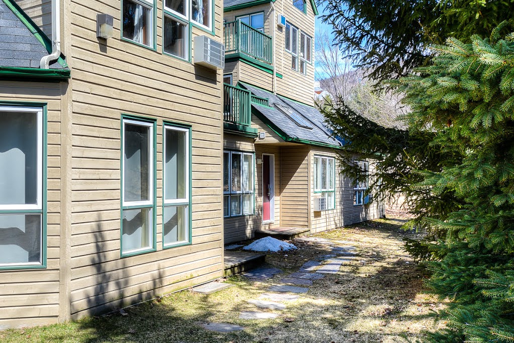 Le Rustique - Condos Mont-Tremblant | 2034 Chemin au Pied de la Montagne #128, Mont-Tremblant, QC J8E 3M2, Canada | Phone: (514) 405-5534