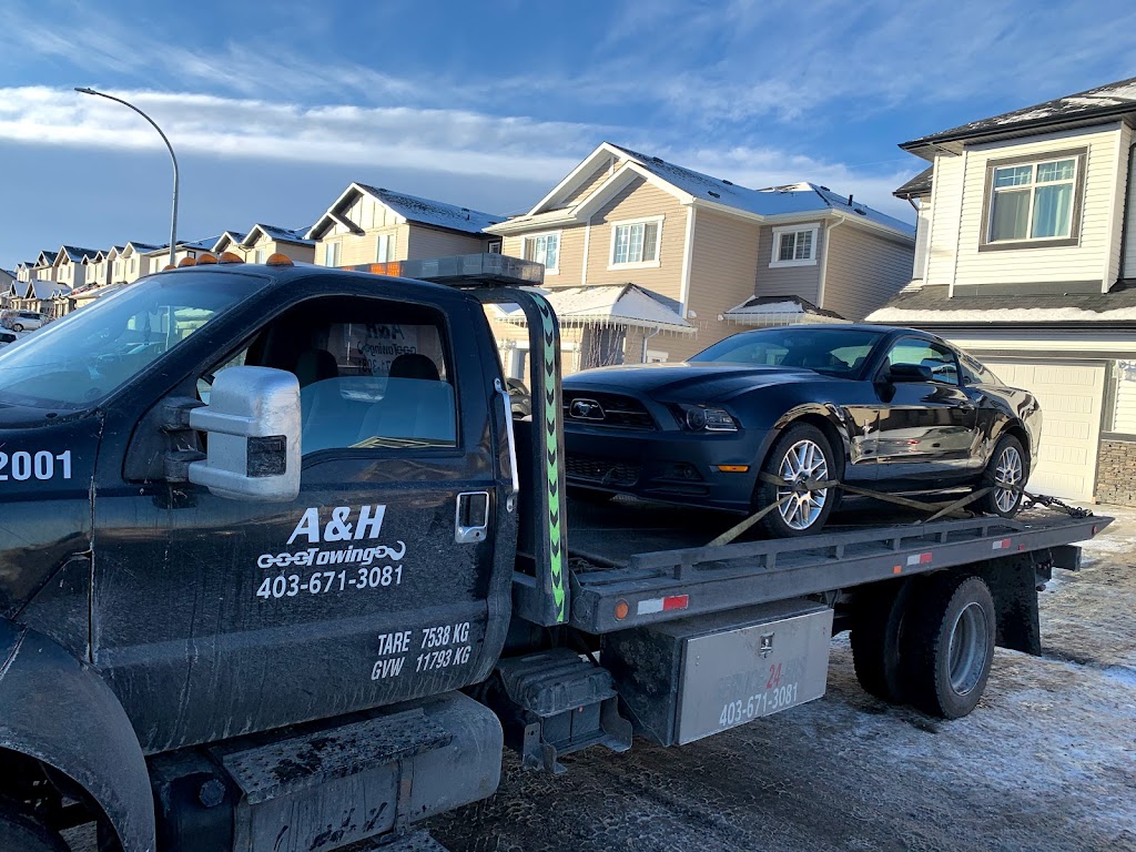 A&H TOWING INC | 3307 48 St NE, Calgary, AB T1Y 1R9, Canada | Phone: (403) 671-3081