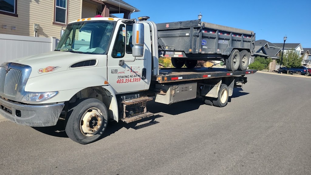 Towing Near Me | 64 Hawkley Valley Rd NW, Calgary, AB T3G 3B1, Canada | Phone: (403) 354-5959