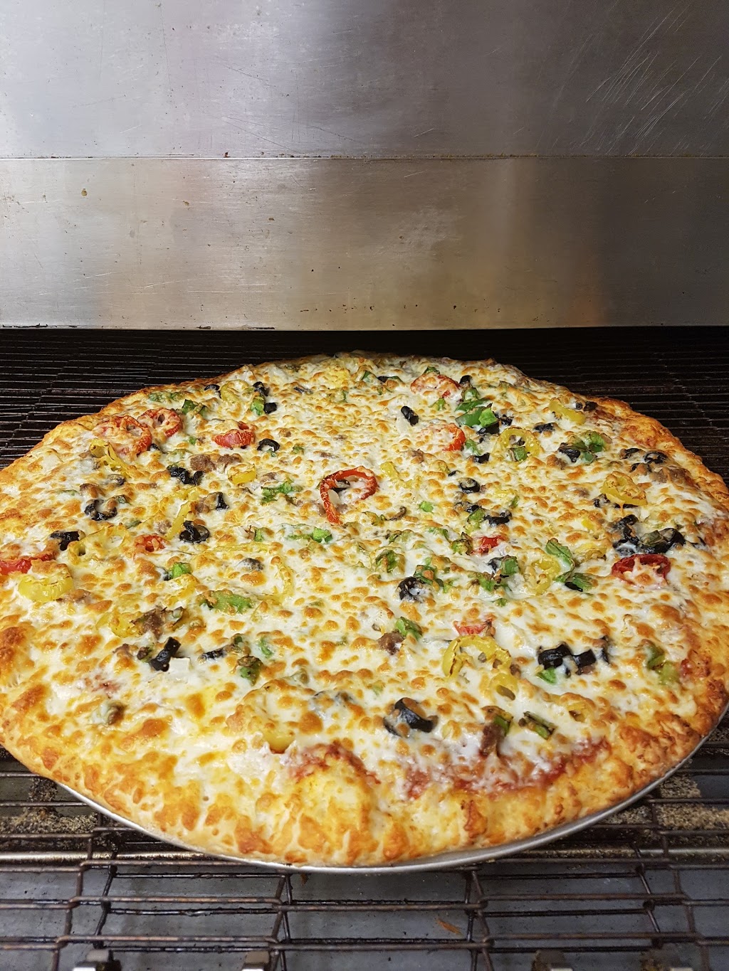 Canadian Pizza Unlimited | 7005 18 St SE, Calgary, AB T2C 1Y1, Canada | Phone: (403) 262-1022