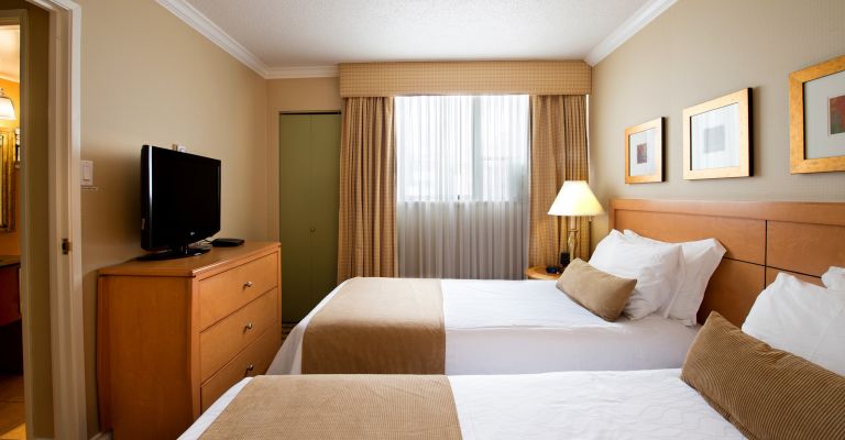 Sunset Inn & Suites | 1111 Burnaby St, Vancouver, BC V6E 1P4, Canada | Phone: (604) 688-2474