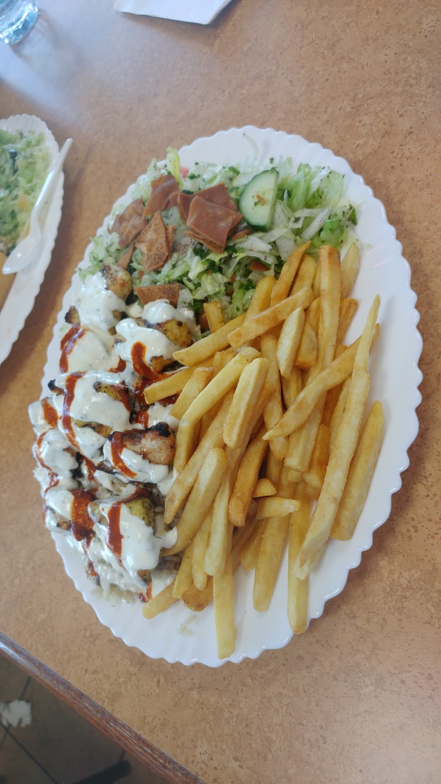 Lazeez Shawarma | 5618 Tenth Line W e7, Mississauga, ON L5M 7L9, Canada | Phone: (905) 285-9996