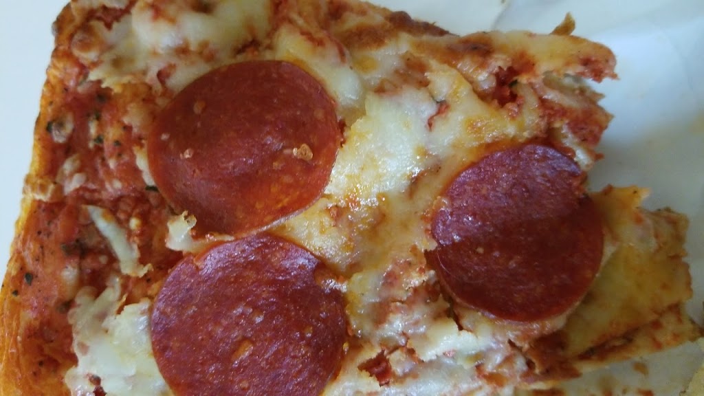 Ginos Famous Pizza | 1656 Nash Rd, Courtice, ON L1E 2Y4, Canada | Phone: (905) 434-4333