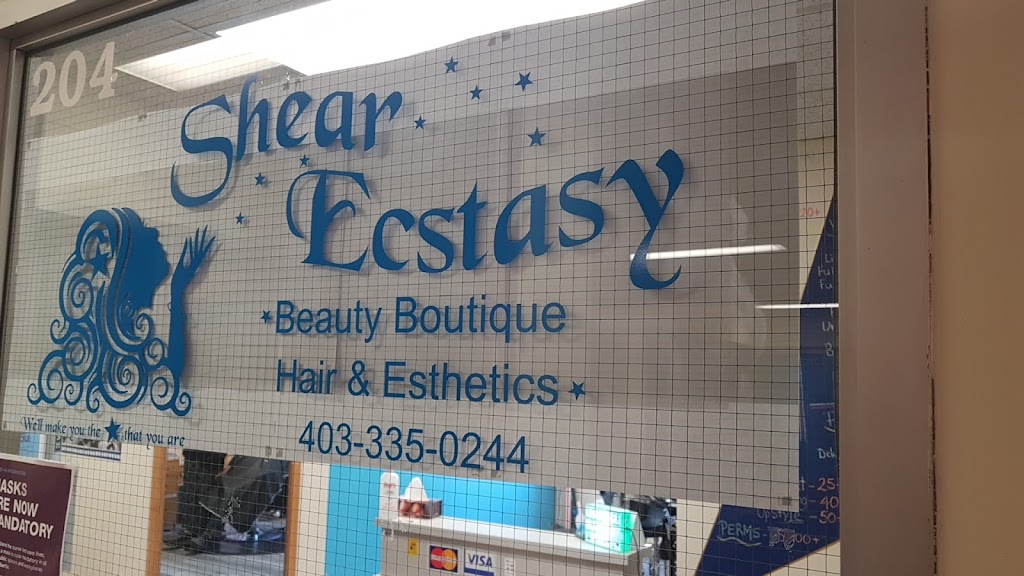 Shear Ecstasy Beauty Boutique | 2034 19 Ave Unit 204, Didsbury, AB T0M 0W0, Canada | Phone: (403) 335-0244