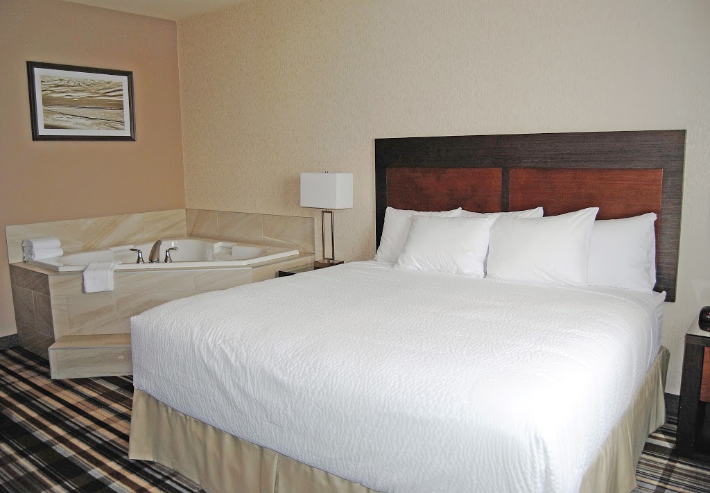 Days Inn & Suites by Wyndham Airdrie | 911 Highland Park Cove Northeast, Airdrie, AB T4A 0R2, Canada | Phone: (587) 600-0297