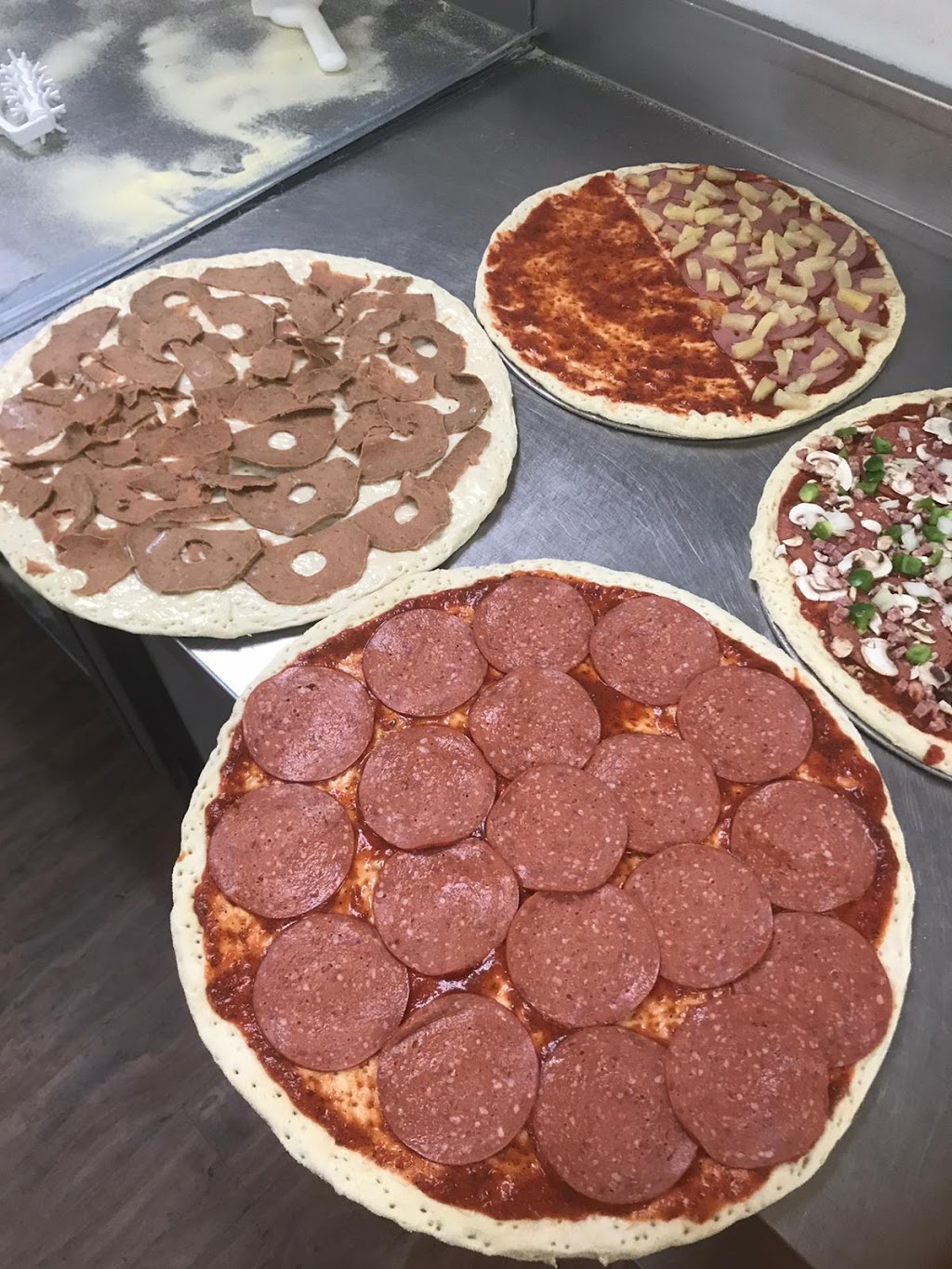 Cosmic Pizza and Donair | 8015 Wagner Rd NW, Edmonton, AB T6E 4N6, Canada | Phone: (780) 220-3000