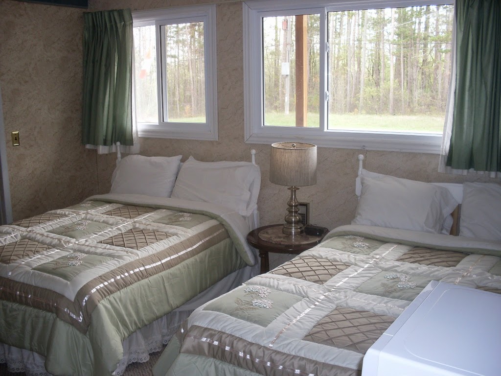 Whispering Pines Motel | 10456 Lakeshore Rd, Grand Bend, ON N0M 1T0, Canada | Phone: (519) 238-2383