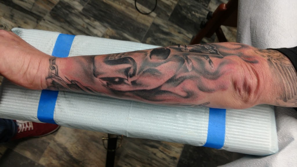 Obsidian Rose Tattoo | 320, 106 W Creek Dr, Chestermere, AB T1X 0B4, Canada | Phone: (403) 272-9799